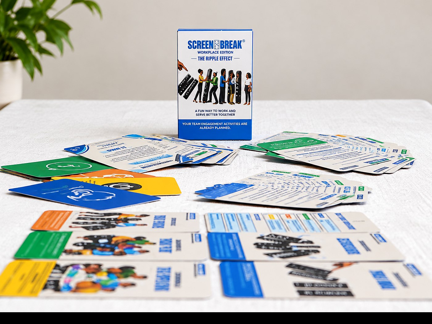 SCREEN BREAK Workplace Edition box standing behind its cards spread out on a table
